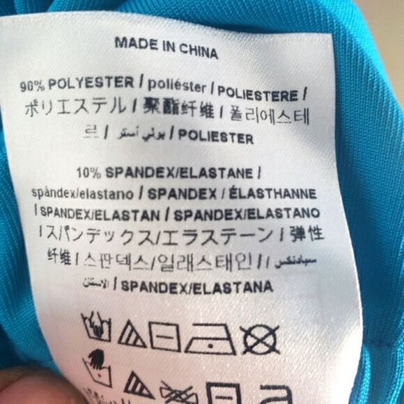 GUESS- A turquoise blue halter top with a keyhole neckline and gold chain straps - Picture 4 of 8